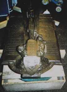 The Old Hornseyans memorial in the workshop, with fire damage